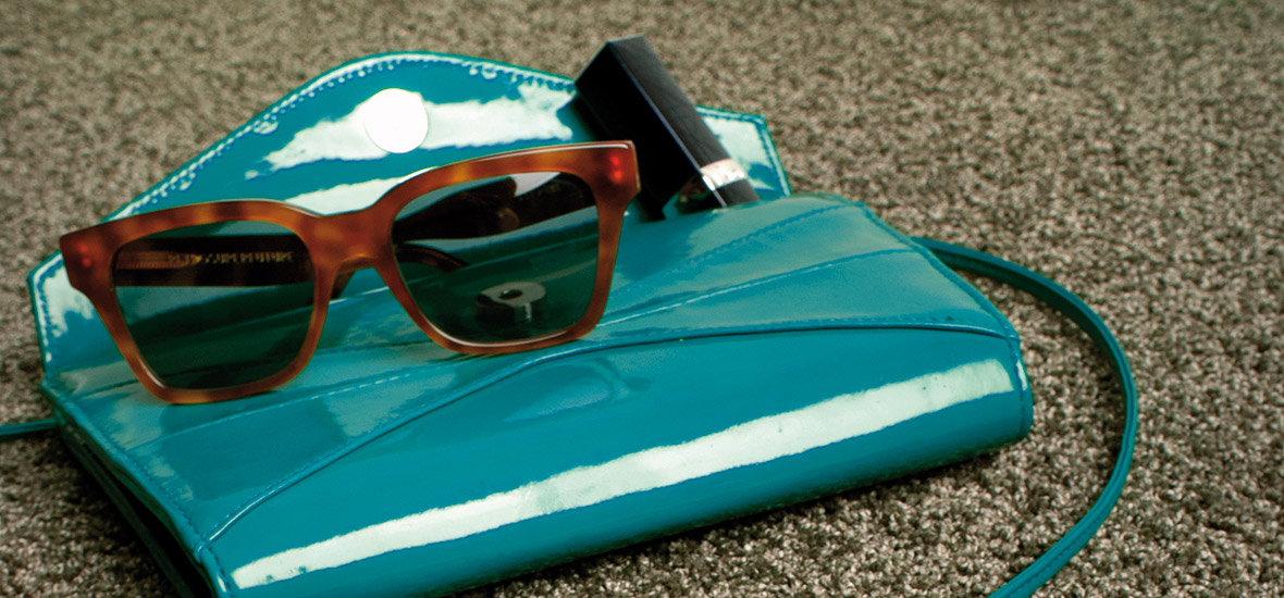 Raumausstattung Raumerfueller Tasche mit Sonnenbrille